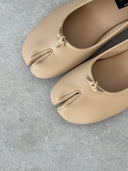 DIVIDED BEIGE
